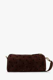 Manu Atelier women’s mini cylinder suede crossbody bag in brown with black circular perforations and gold-tone hardware