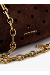 Manu Atelier women’s mini cylinder suede crossbody bag in brown with gold-tone paperclip chain and perforated design