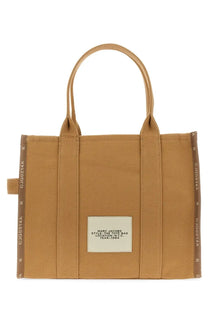 Tan canvas marc jacobs tote bag with brown trim and white label for women large beige style in nyc