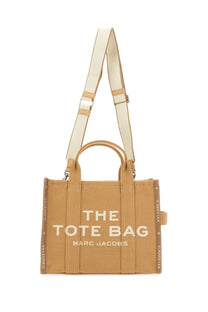 Marc Jacobs women’s borsa the tote medium beige tan canvas tote bag with white lettering and matching shoulder strap