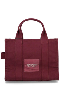 Maroon marc jacobs women’s borsa the tote small canvas tote bag with matching handles and front patch label