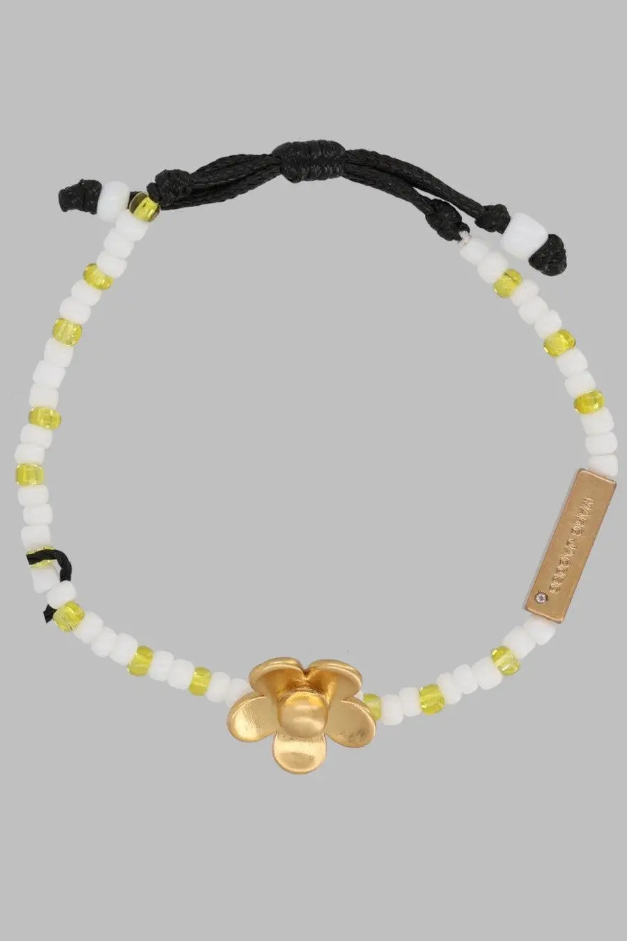 Marc Jacobs women’s bracciale daisy adjustable bracelet with black cord white yellow beads and gold-toned flower charm
