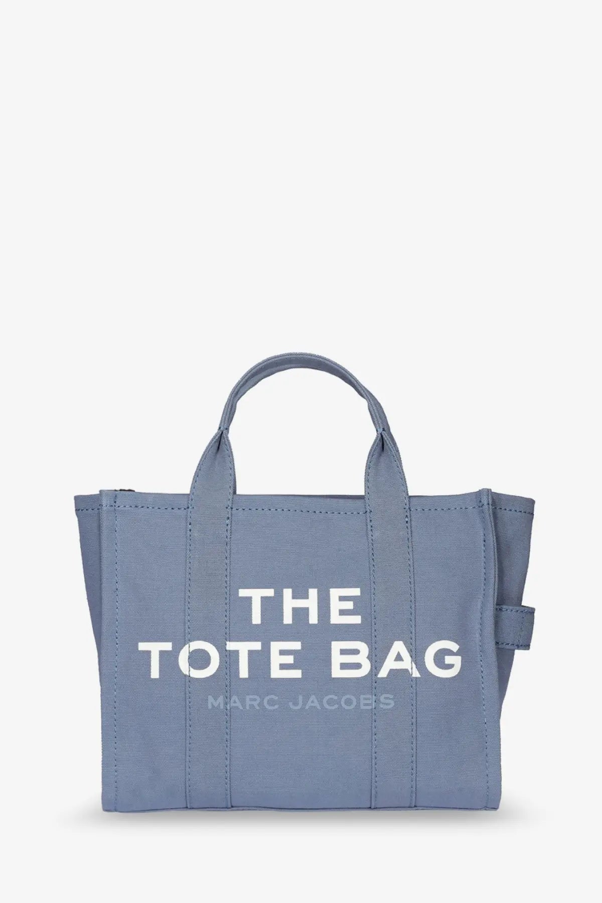 Light blue canvas marc jacobs medium tote bag with white the tote bag lettering and crossbody design