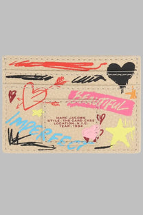 Beige leather card case with vibrant red black pink and yellow graffiti artwork marc jacobs women portacarte the punk scribble