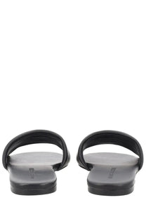Marc Jacobs women’s black leather slide sandals with sleek minimalist design and embossed brand name on the insole