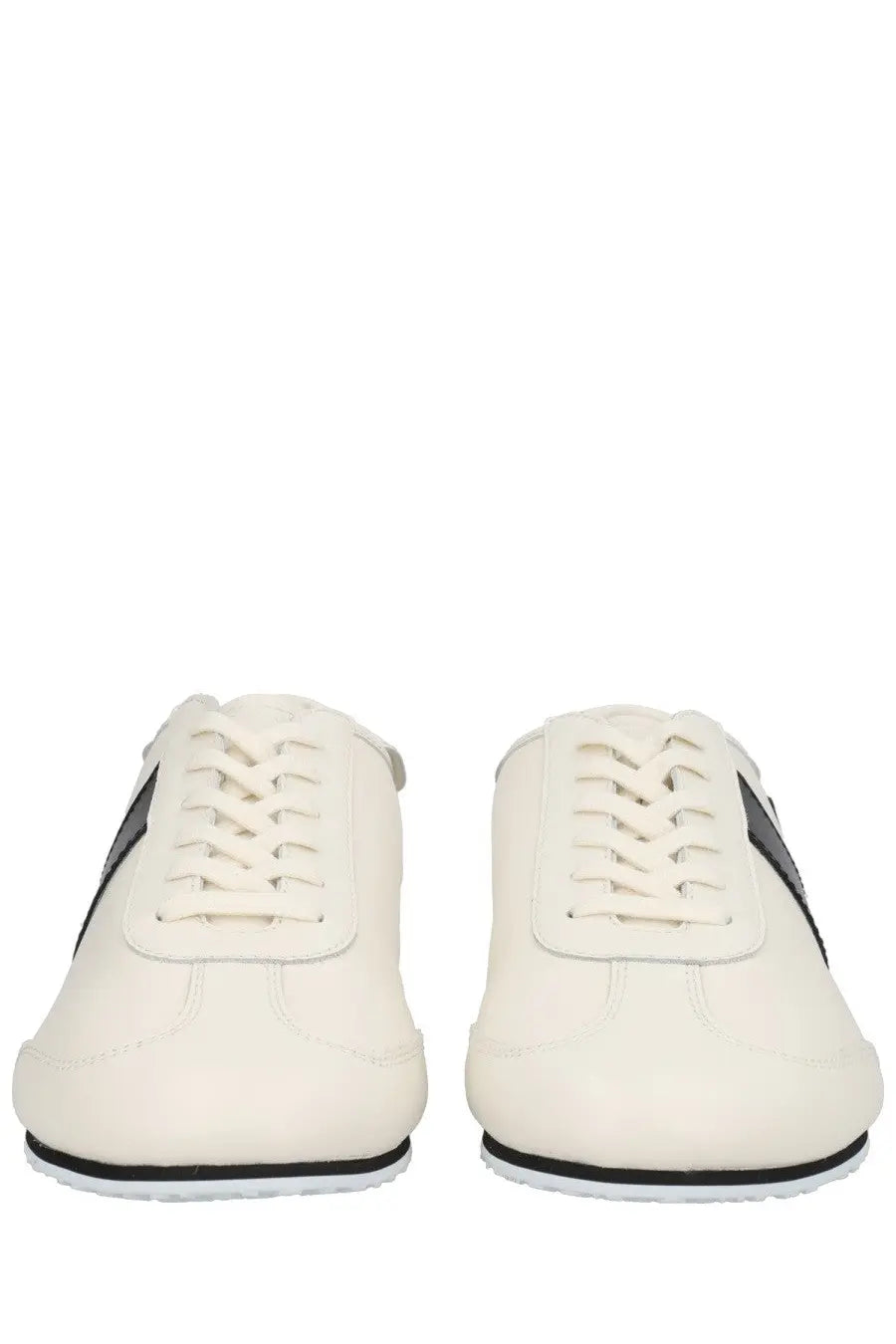 Cream-colored leather marine serre men’s astra sneaker with black accents and laces in white