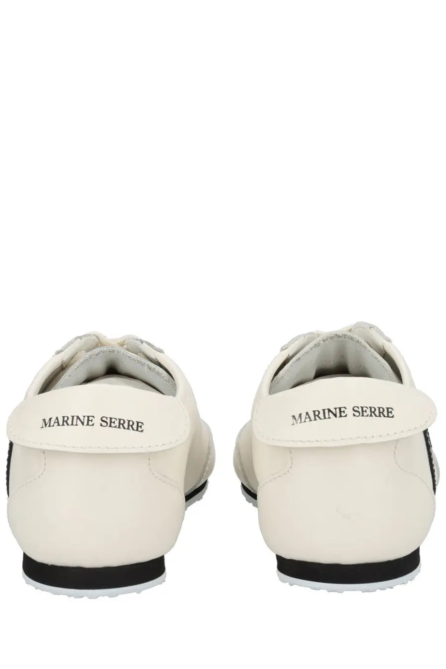 Back view of marine serre men’s astra sneaker in white leather with black accents and marine serre branding on the heel tab