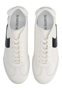 Marine serre men’s astra sneaker white leather with black side stripes and marine serre branding on the insole