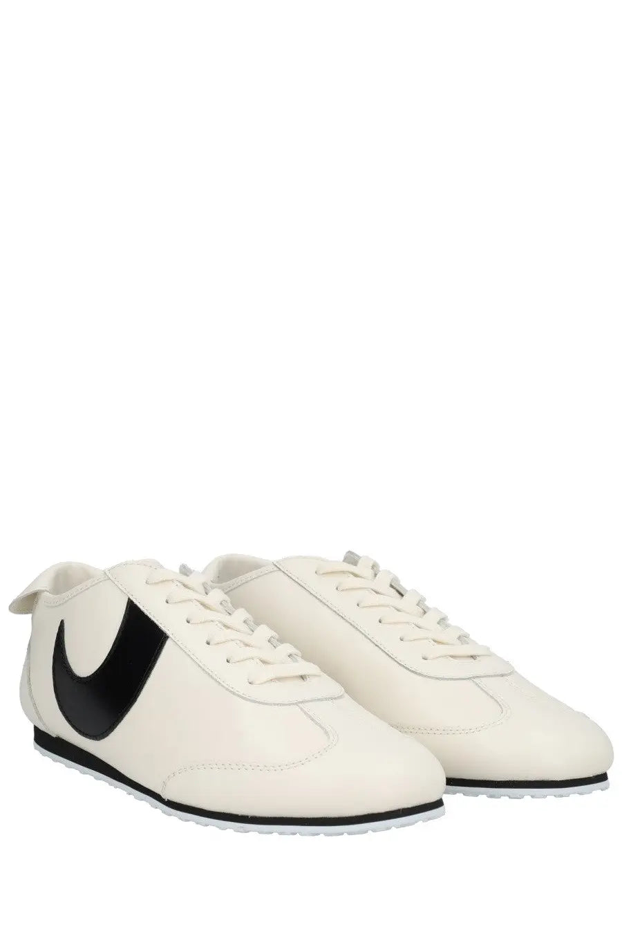 Marine serre men’s astra sneaker white with bold black nike swoosh, classic leather, and black rubber soles