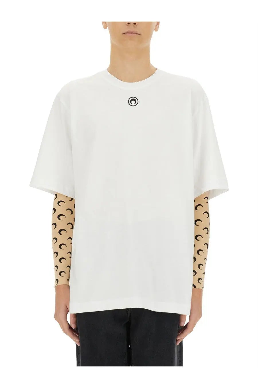 Marine Serre men’s white oversized jersey t-shirt with small black circular logo and beige patterned arm sleeves underneath
