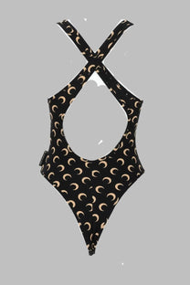 Marine serre women’s black one-piece swimsuit with beige crescent moon pattern and x-back design shown from the back