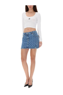 Blue denim mini skirt with a repeating crescent moon pattern from marine serre women’s short moon top white collection