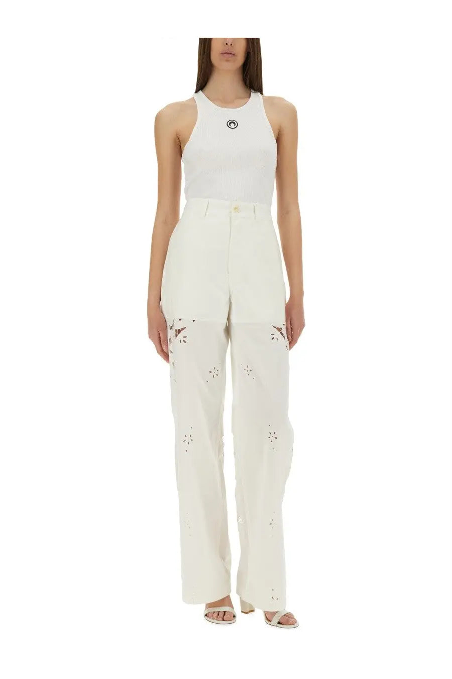 White high-waisted trousers with delicate floral eyelet detailing on the legs from marine serre women’s top con moon white collection