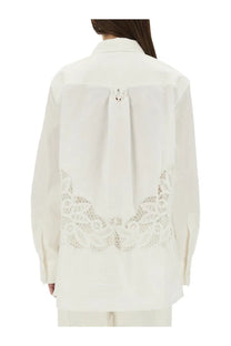Marine serre women’s upcycled linen white blouse showing back with delicate lace trim and subtle neckline embellishment
