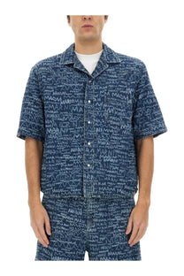 Marni men’s blue denim short-sleeved bowling shirt with repeating white marini graffiti-style print