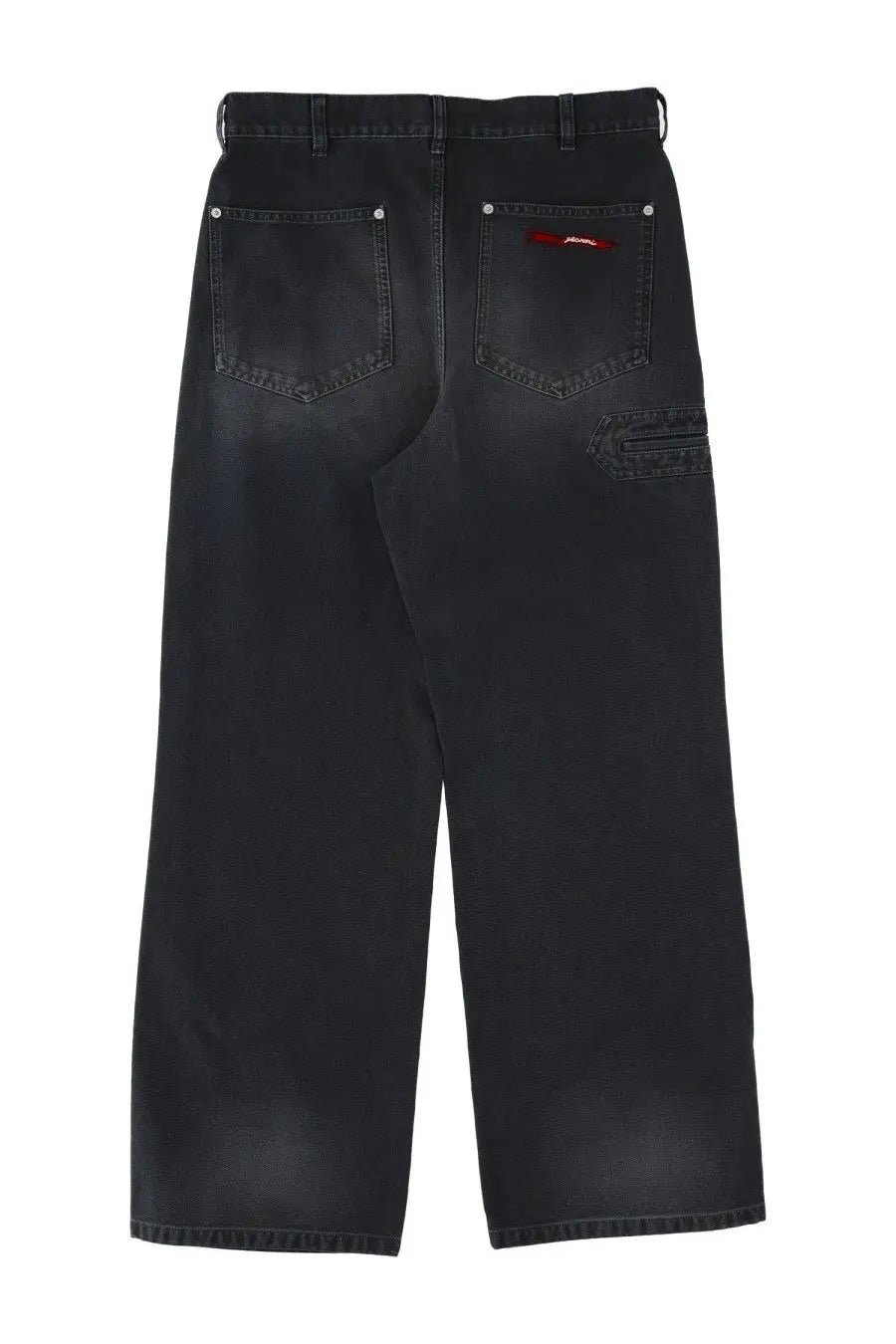 Back side of marni men’s black denim jeans with faded wash silver rivets on pockets and red brand tag