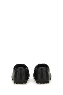 Marni men’s softy doccer sneaker black slip-on shoes with black leather upper and textured rubber soles