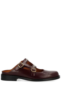Marni women’s moccasin sabot in polished burgundy leather with two gold buckle straps and black rubber sole