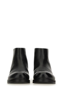 Marsell men’s pumpkin wedge boot black leather ankle boot with glossy finish and rounded toe design