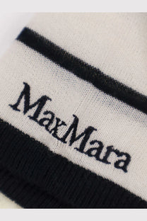 White knit sock with black ribbed cuffs and stripe featuring max mara logo paired with cashmere silk blend sweater