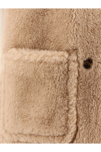 Max mara women’s beige cashmere and silk cape showing plush shearling coat pocket with dark button detail