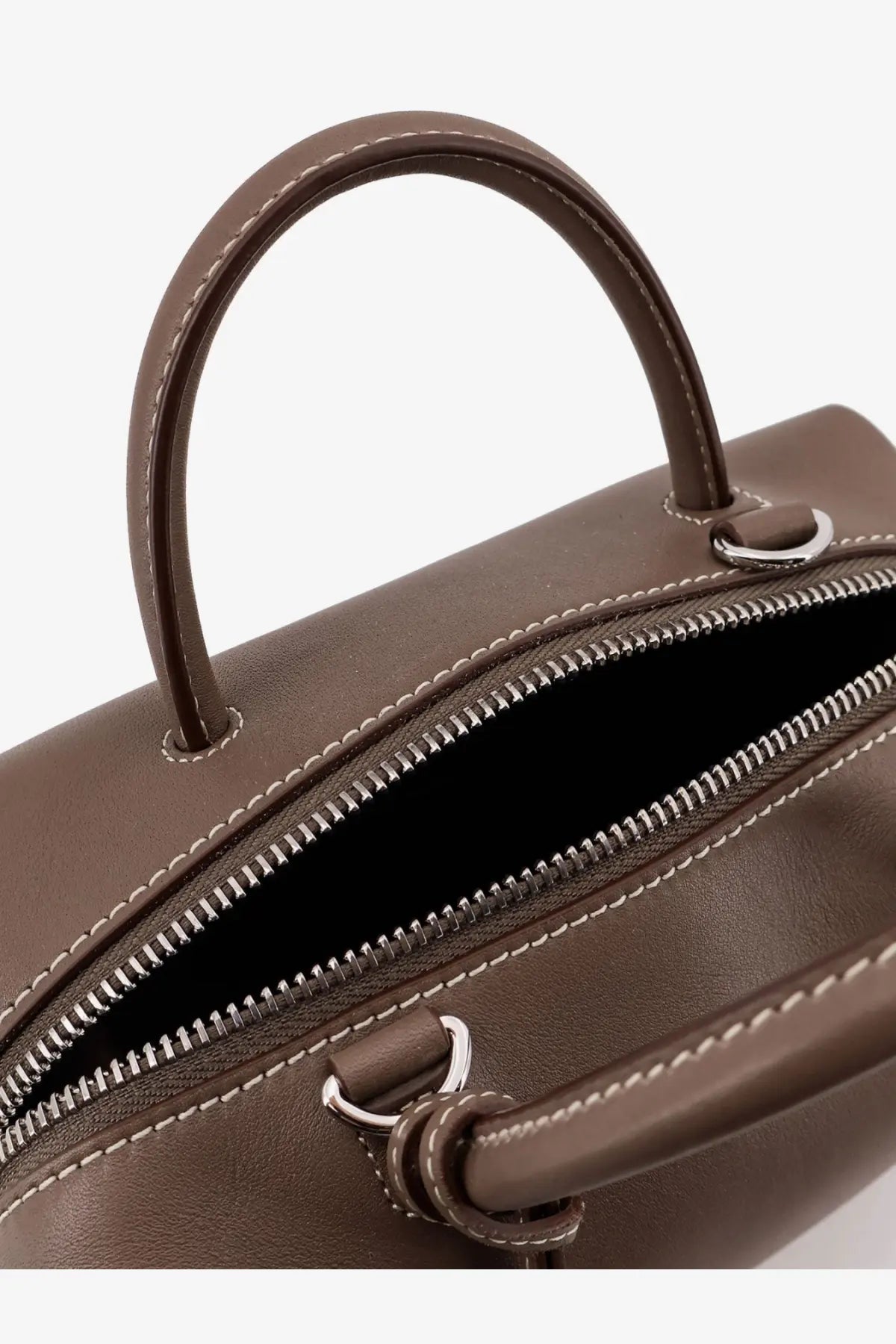 Brown leather Max Mara women’s holdalls handbag with silver-toned zipper and matching stitching in gold accents