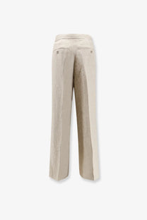 Back view of max mara women’s linen ginnico trousers in beige with wide legs textured fabric and two back pockets with buttons