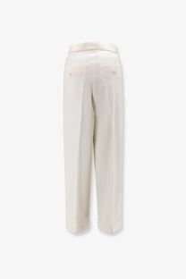 Cream-colored max mara womens mxmrugiada tailored virgin wool trousers with sleek straight-leg cut and subtle back pleats