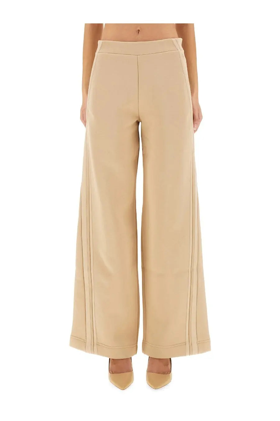 Max mara women’s beige wide-leg pants with tailored fit and subtle vertical seam detailing along the sides