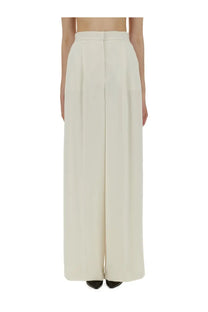 Cream-colored max mara women’s high-waisted wide-leg trousers with sleek tailored design in handcuff white