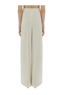 Max Mara women’s handcuff white cream-colored high-waisted wide-leg trousers with smooth flowing fabric