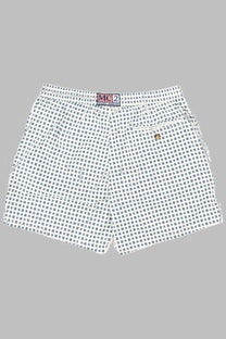 White shorts with a black geometric pattern featuring m2 and ralph lauren logos on the waistband by mc2 saint barth