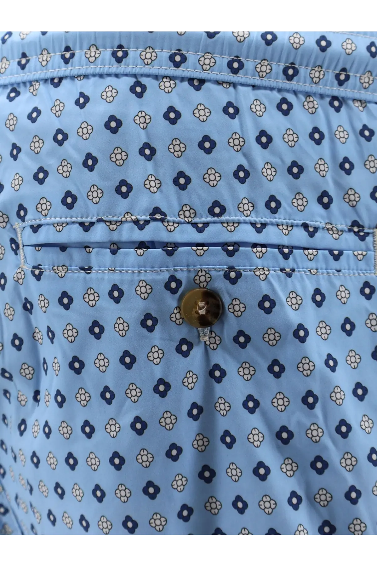 Mc2 Saint Barth men’s light blue cotton shorts with navy and white floral pattern and single button closure
