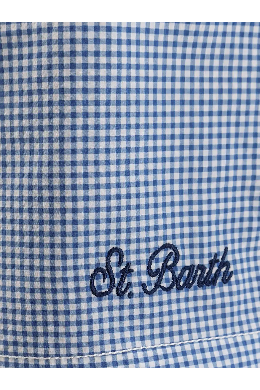 Blue and white gingham nylon fabric detail on the st back of mc2 saint barth men’s swim shorts blue