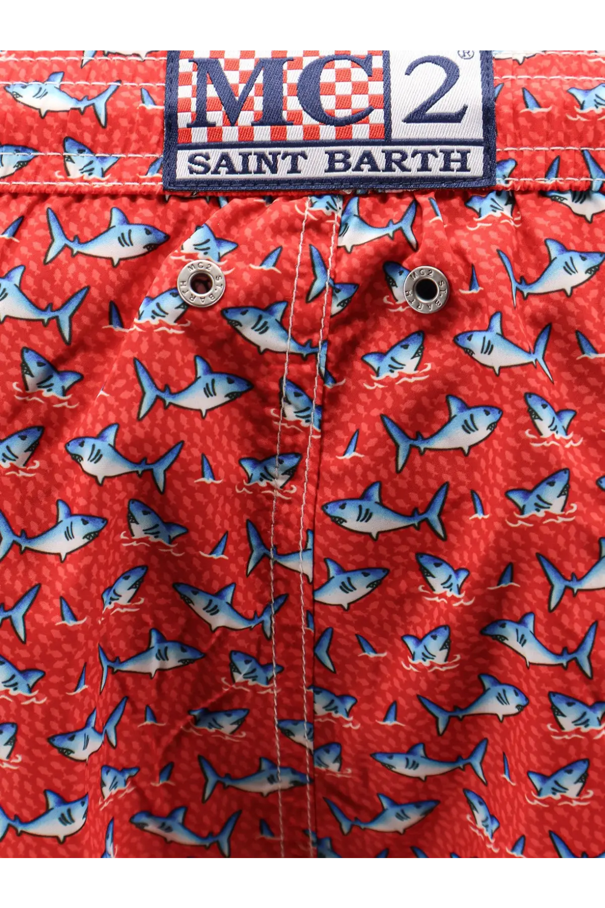 Red shark-patterned men’s swim trunks in recycled polyester by mc2 saint barth in red color