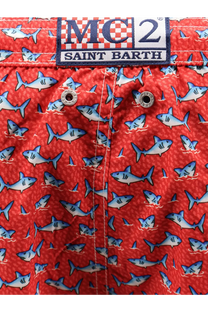 Red shark-patterned men’s swim trunks in recycled polyester by mc2 saint barth in red color