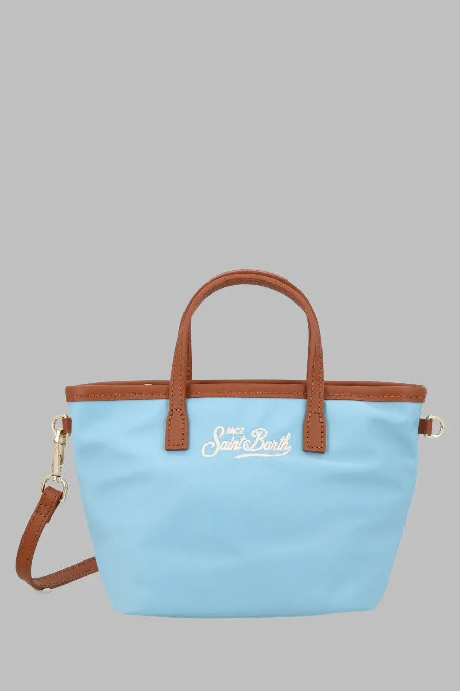 Light blue nylon Mc2 Saint Barth women’s tote bag with brown leather handles and white saint barth logo in cursive
