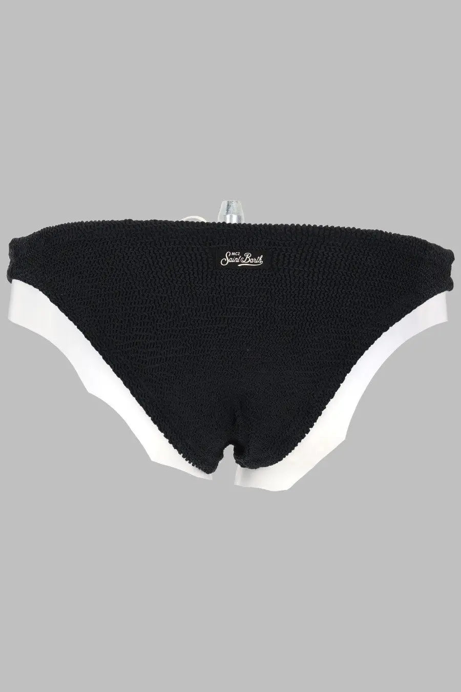Black knitted bikini bottom with white trim and saint barth logo on waistband from mc2 saint barth slip bikini crinkle elise collection
