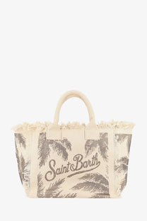 Beige canvas tote bag with frayed edges and black palm tree print featuring Saint Barth logo in cursive script