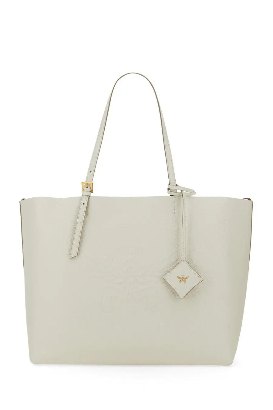 A sleek off-white leather mcm womens shopping tote bag with gold-tone hardware and diamond-shaped logo tag