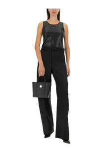 Black mcm tote bag with signature monogram pattern and silver-tone hardware perfect for everyday use