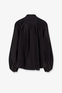 Black cotton mes demoiselles celeste shirt with gathered back and voluminous sleeves shown from the back side