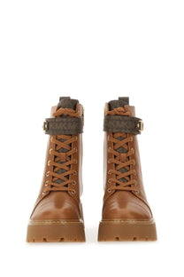 Michael Kors women’s amphibious boot Mandy beige brown leather combat boots with chunky sole and gold-tone eyelets