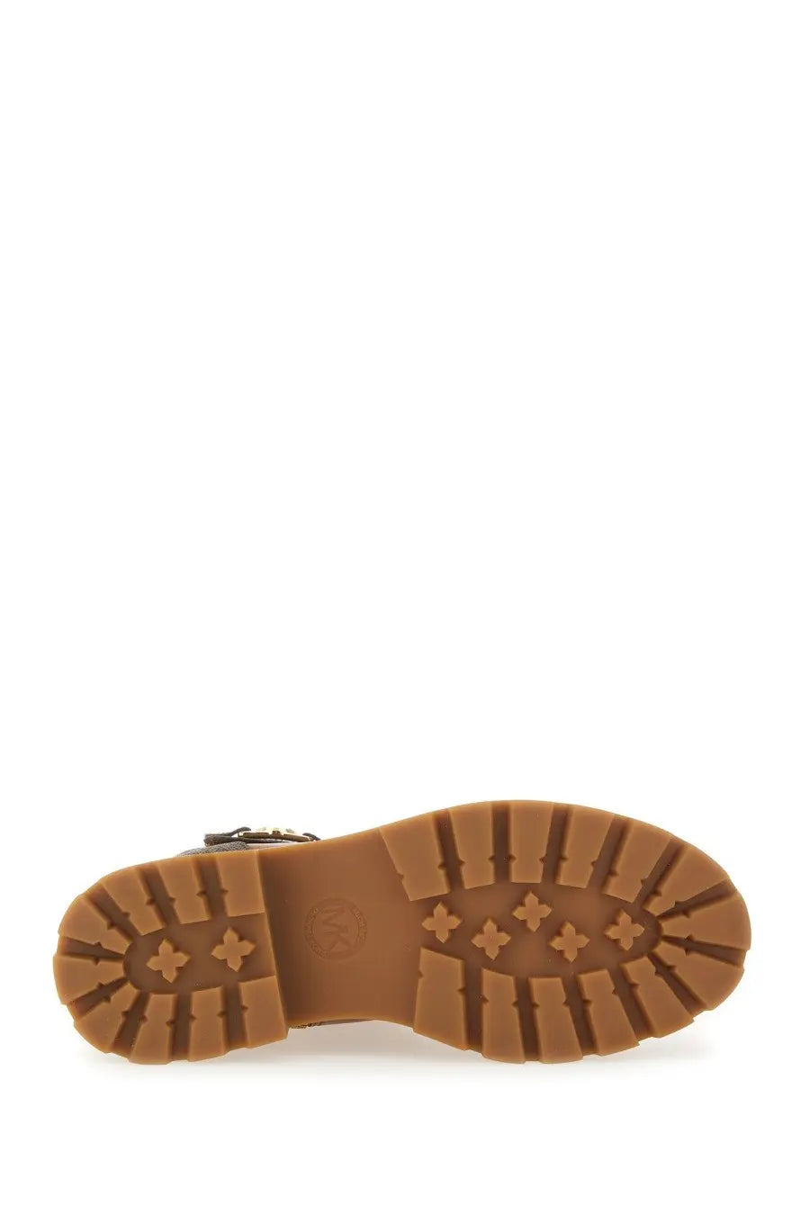 Brown rubber sole with textured tread and diamond embossments on michael kors women’s amphibious boot mandy beige