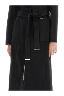 Michael Kors women’s black wool coat with belted waist, front pockets, and subtle metallic hardware accents