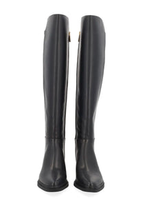 Michael Kors women’s black leather knee-high boots with sleek glossy finish and subtle gold inner zippers