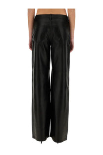 Michael Kors women’s black faux leather wide-leg pants with a sleek glossy finish and clean stitching details