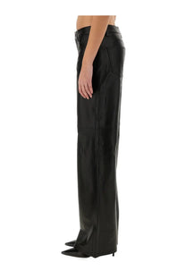 Black leather trousers by michael kors with a sleek straight-leg cut and visible stitching details