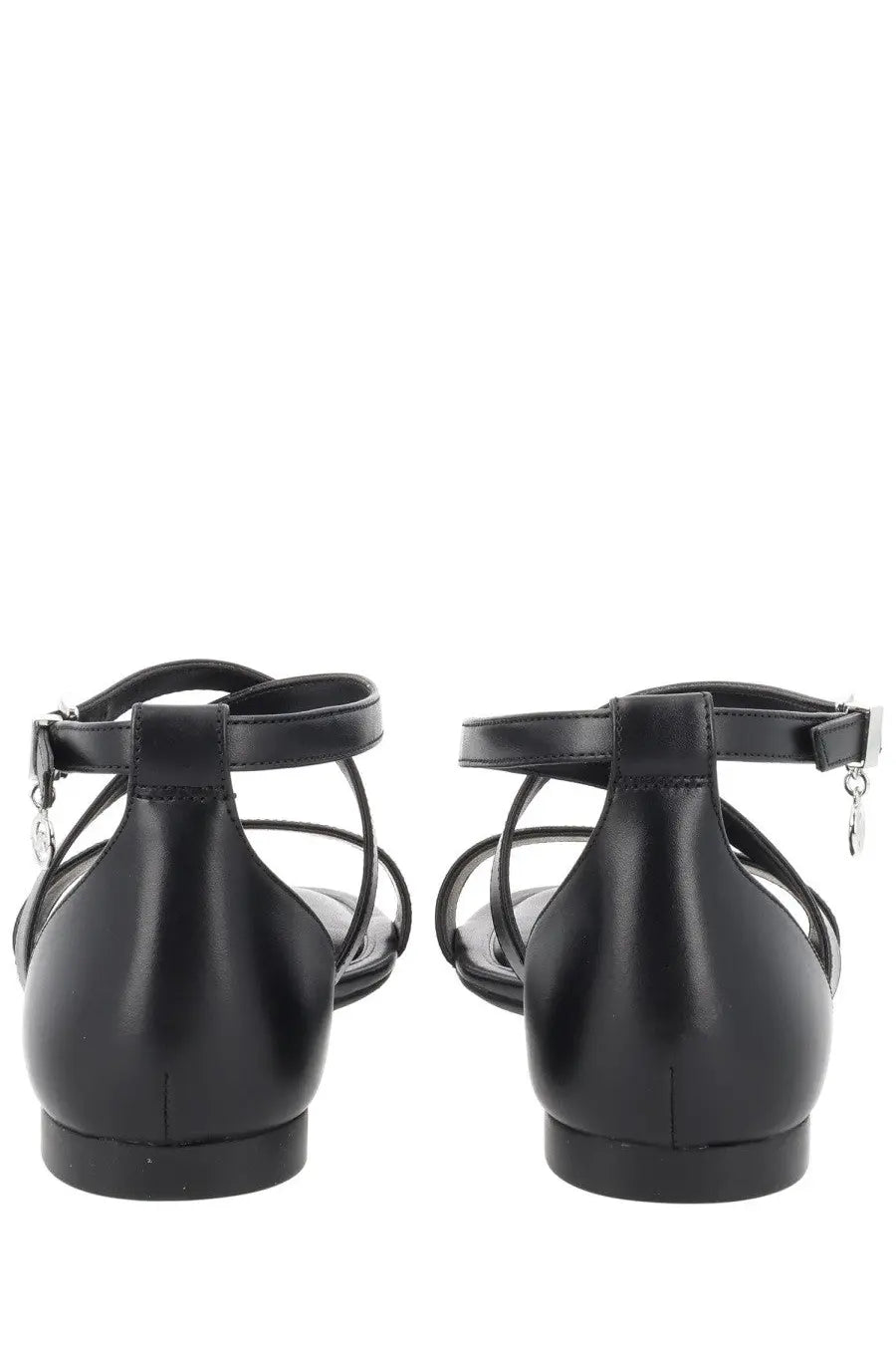 Michael Kors women’s Alexa black patent leather t-strap sandals with low block heel and silver buckle accents