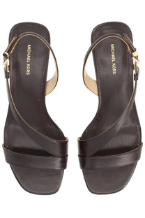 Michael Kors women’s brown leather sandals with gold-tone hardware and cross-strap design for stylish wear